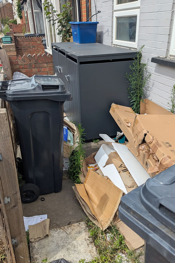 Rubbish in front of house 