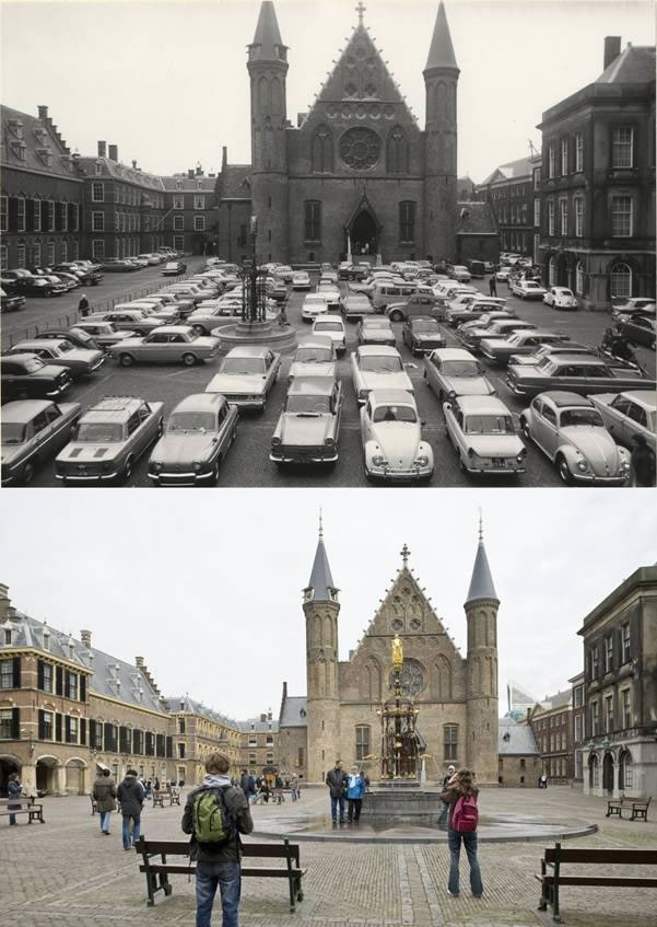 A group of people walking on a city street  Description automatically generated