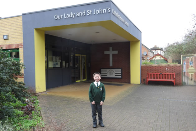 James &lsquo;JC&rsquo; Connor outside his school in Brentford 