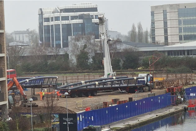 A new span being unloaded at Brentford Dock