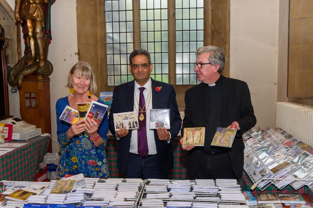 (l-r) Sue Green, founder Ealing Charity Christmas Card Shop; Ealing&rsquo;s Immediate Past Mayor, Councillor Munir Ahmed; and Father Richard Collins, Vicar of Parish Church of Christ the Saviour.