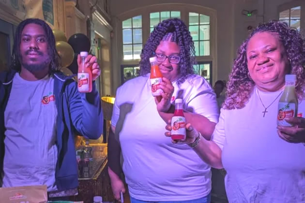 Elaisha and her two eldest children, supporting St Ann&rsquo;s School leavers prom, with her juice bar