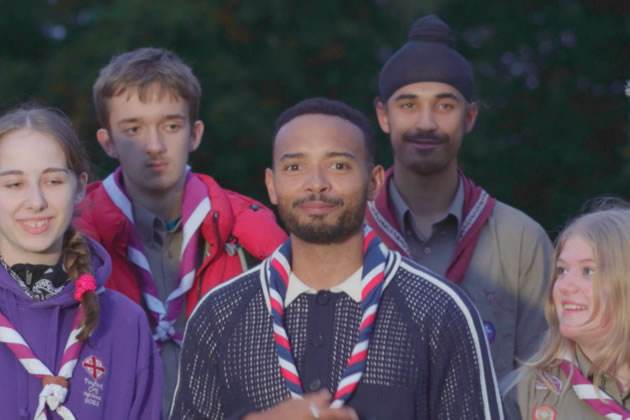 Liam McDevitt (centre) with local scouts 