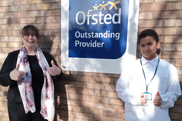 Staff and pupils celebrating ranking of Sybil Elgar School