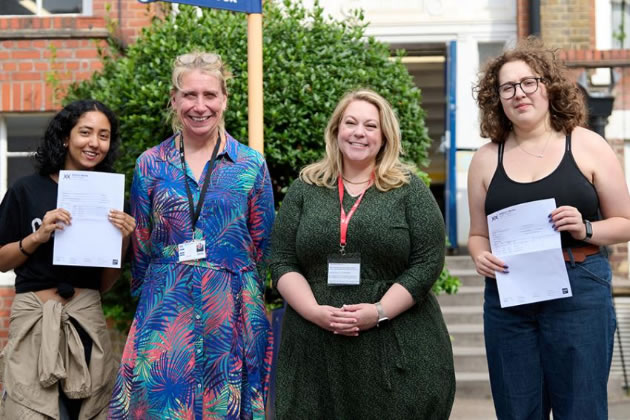 Teachers and pupils at William Morris Sixth Form with A Level results